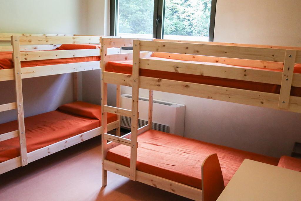 Oasi Hostel Merone Pokoj fotografie