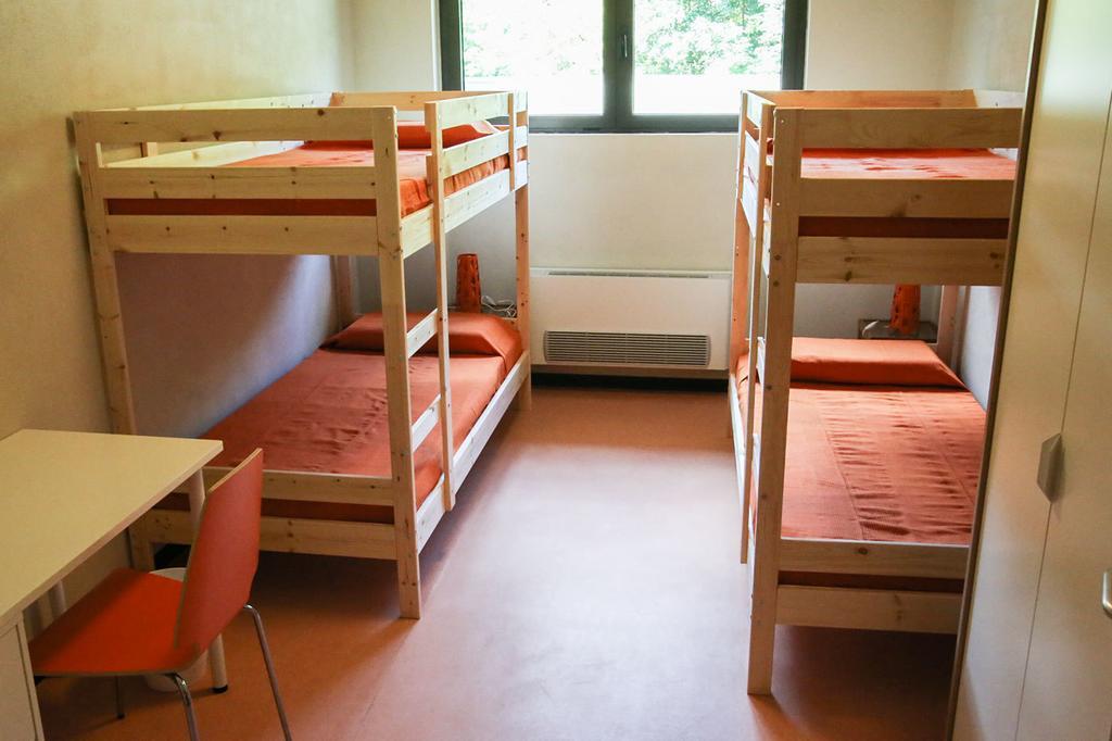 Oasi Hostel Merone Pokoj fotografie