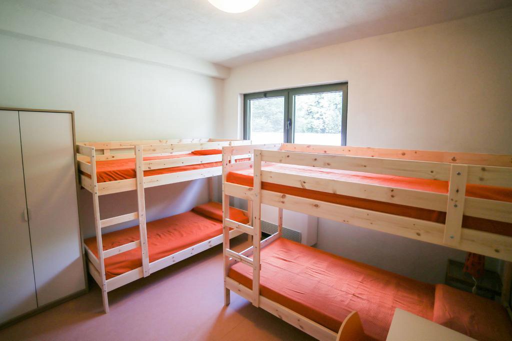 Oasi Hostel Merone Pokoj fotografie